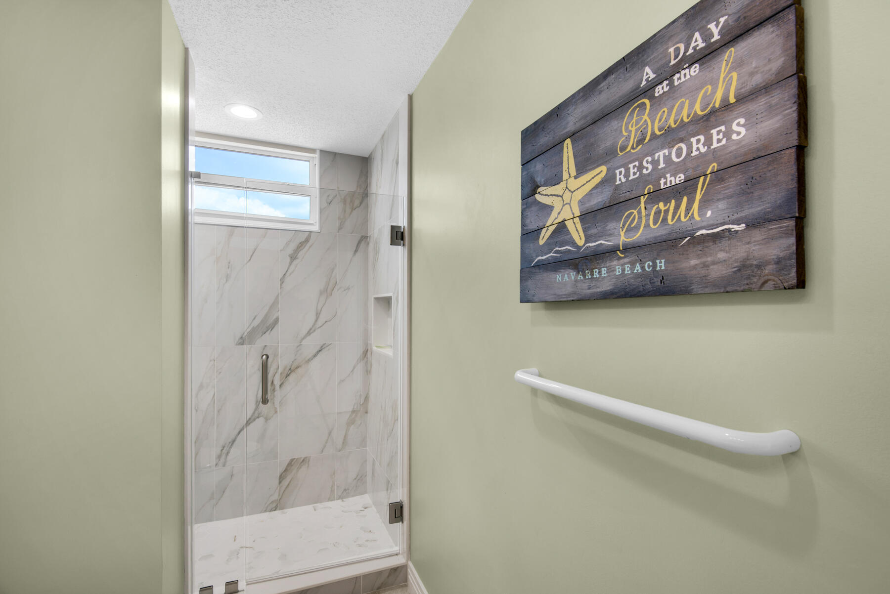 8501 Gulf Boulevard, Unit WPH3A Navarre, FL 32566 - Photo 42 of 66 a bathroom with a shower