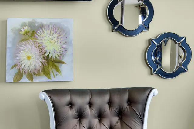 a bedroom with furniture and flat screen tv