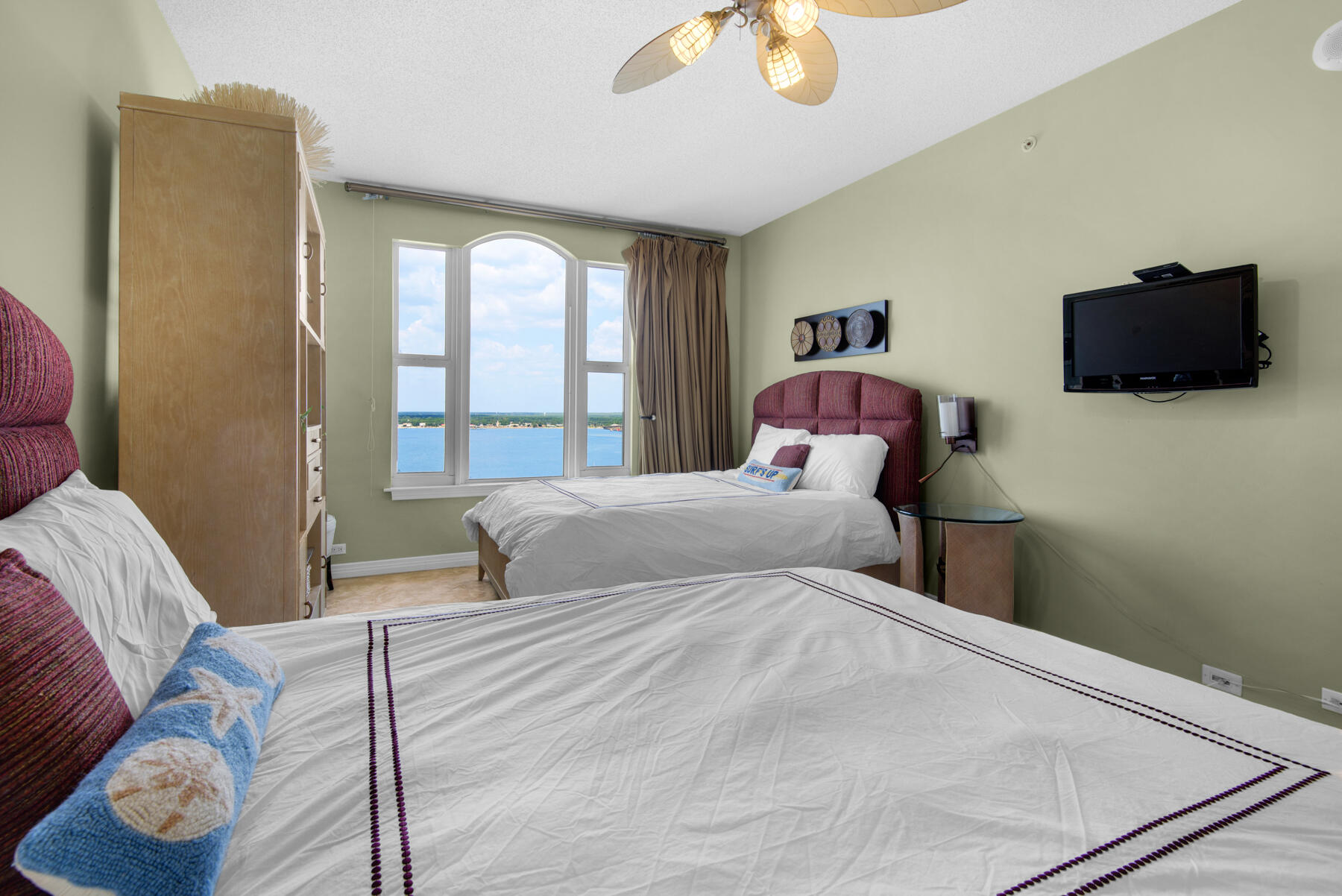 8501 Gulf Boulevard, Unit WPH3A Navarre, FL 32566 - Photo 45 of 66 a bedroom with a bed and window
