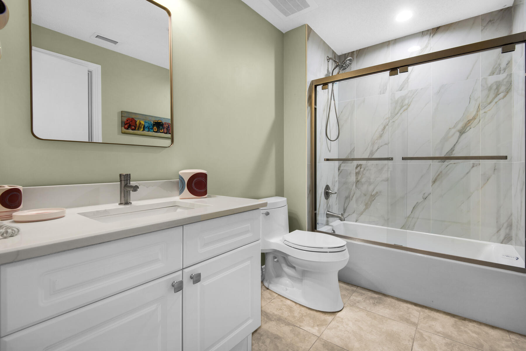 8501 Gulf Boulevard, Unit WPH3A Navarre, FL 32566 - Photo 47 of 66 a bathroom with a sink toilet and shower