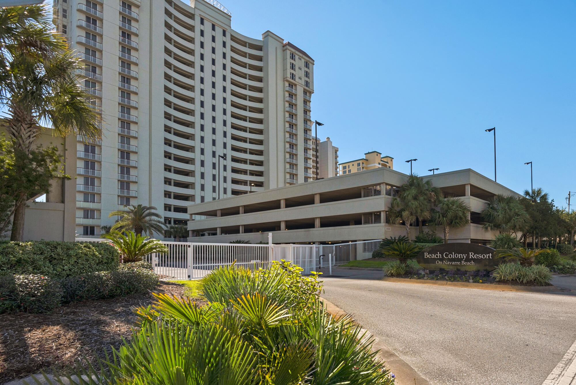 8501 Gulf Boulevard, Unit WPH3A Navarre, FL 32566 - Photo 51 of 66 a view of a tall building and a yard