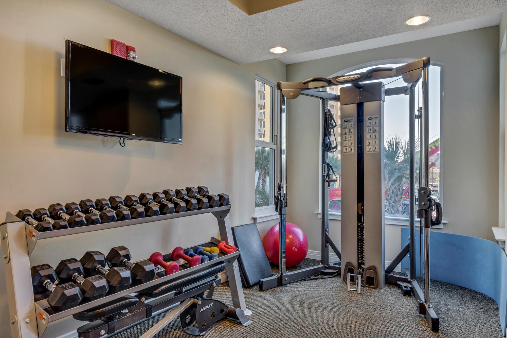 8501 Gulf Boulevard, Unit WPH3A Navarre, FL 32566 - Photo 53 of 66 a bedroom with furniture and flat screen tv