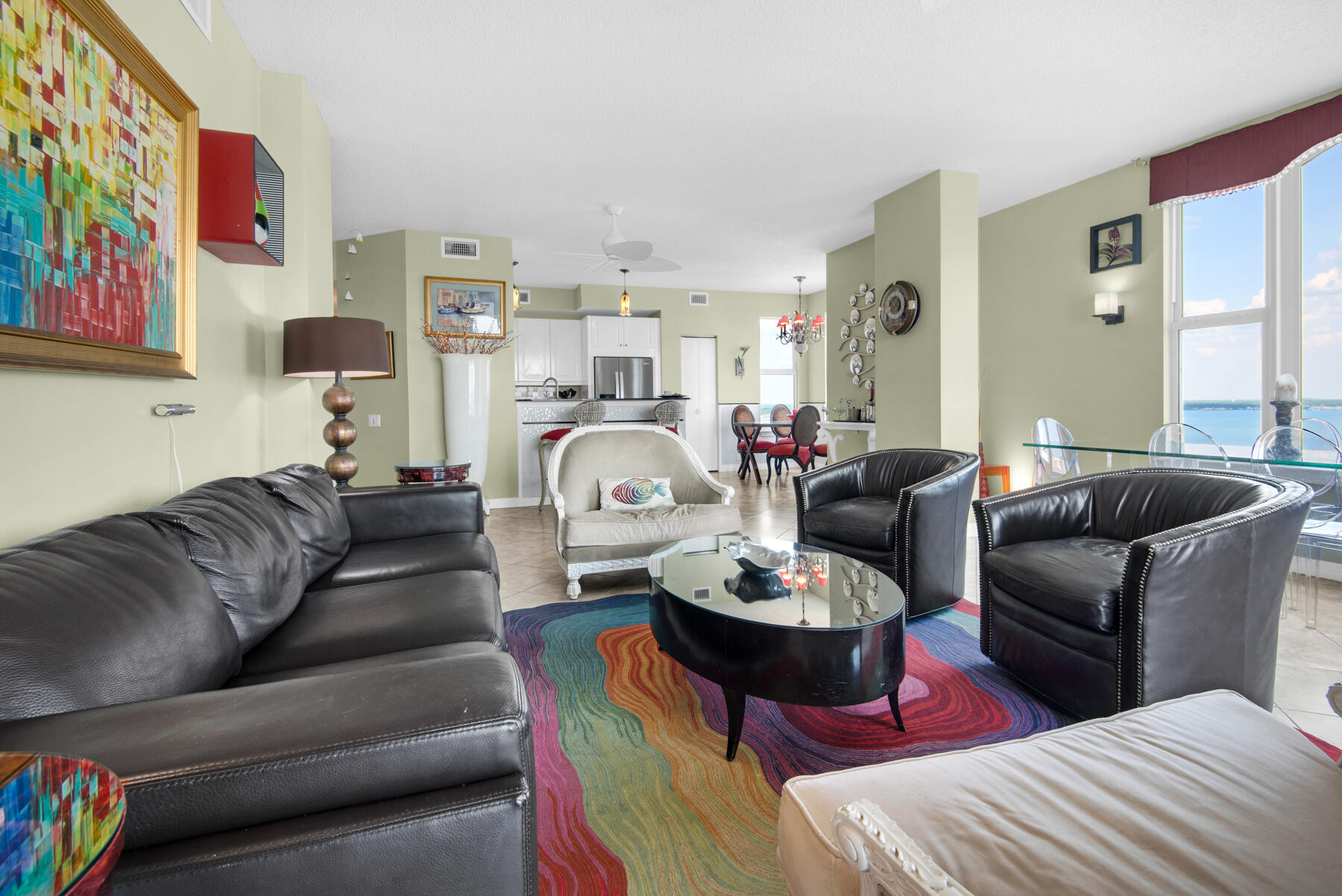 8501 Gulf Boulevard, Unit WPH3A Navarre, FL 32566 - Photo 9 of 66 a living room with furniture and a wooden floor
