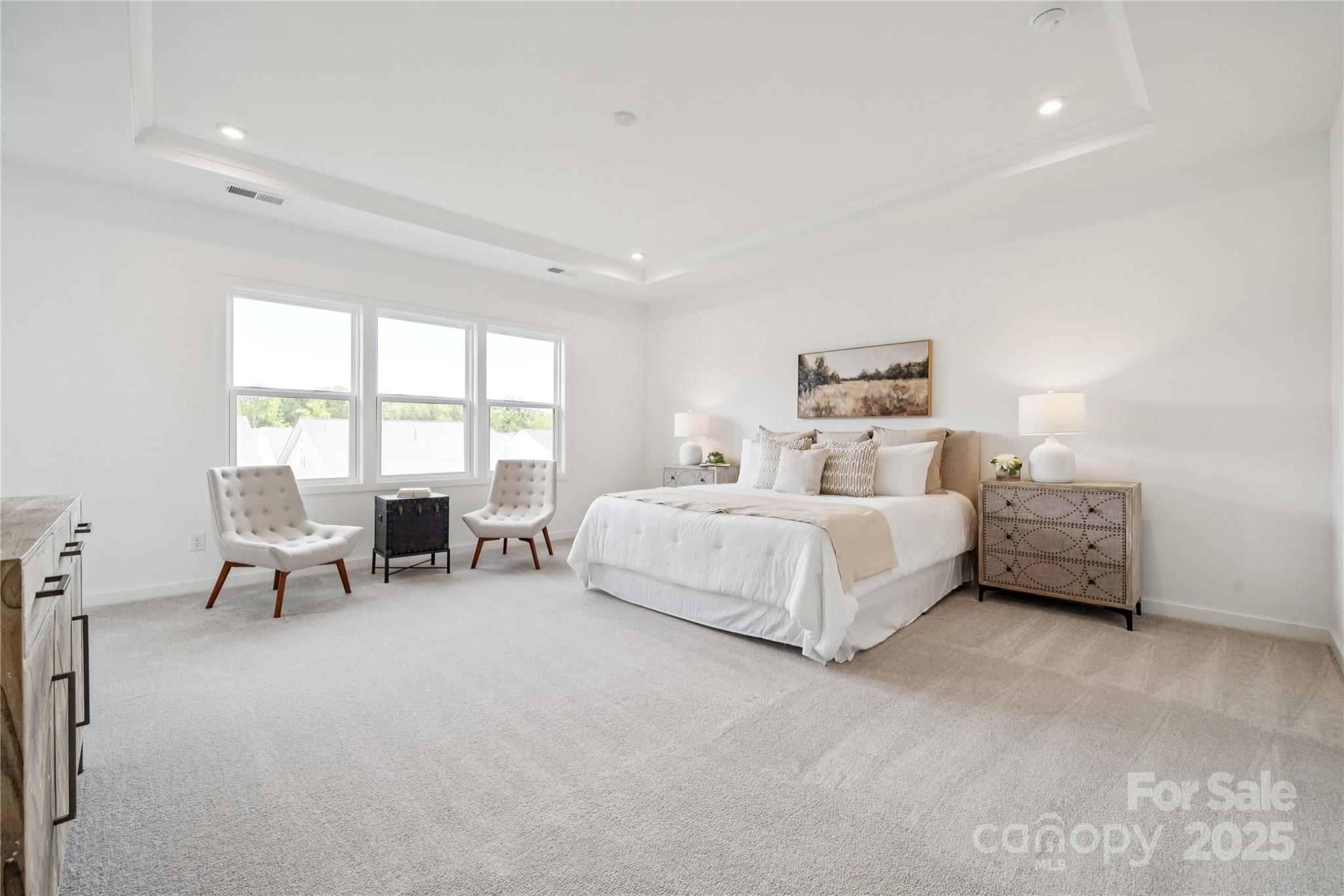 5259 Vernon Rdg Road, Unit 76 Huntersville, NC 28078 - Photo 11 of 14 a bedroom with bed and a large window