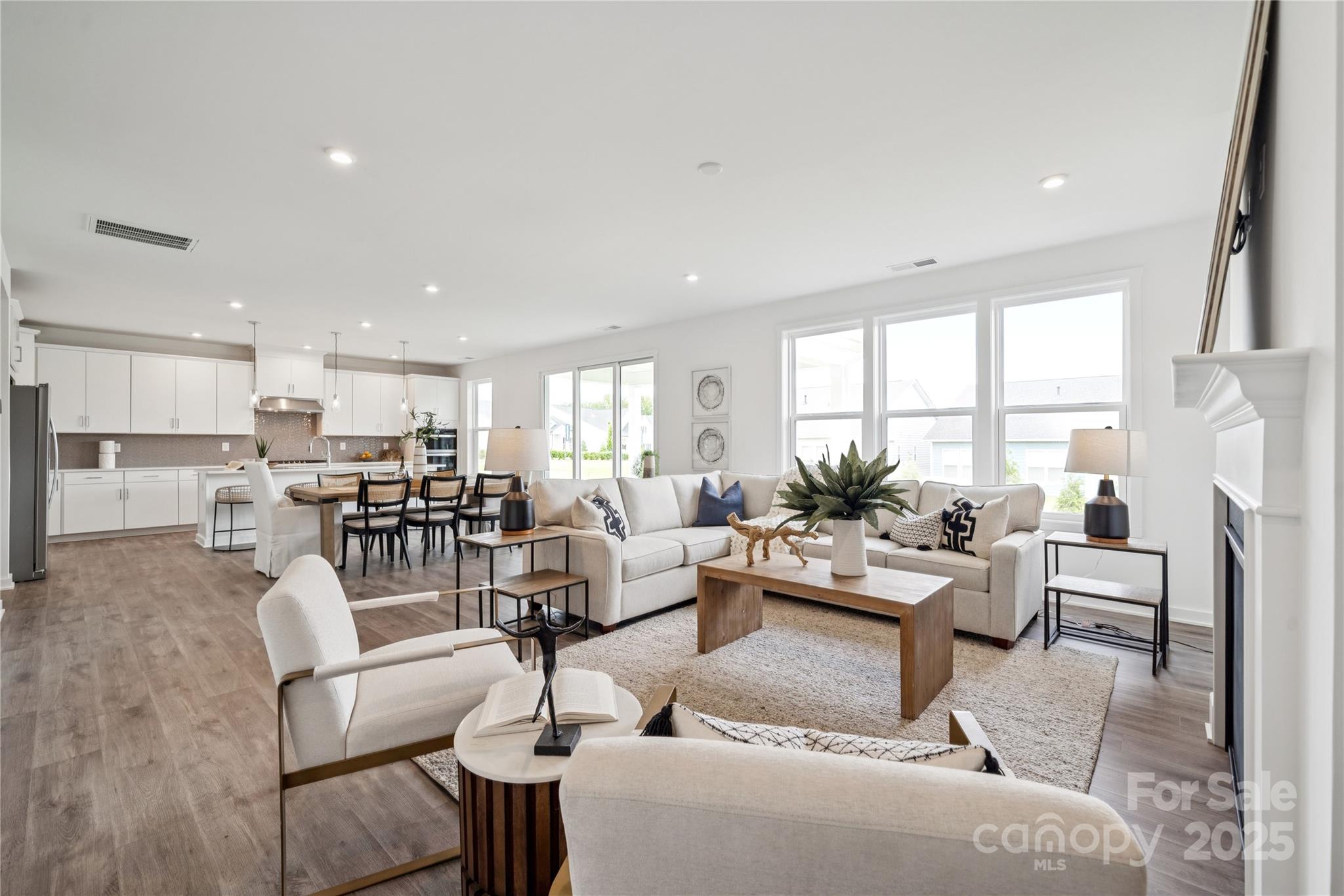 5259 Vernon Rdg Road, Unit 76 Huntersville, NC 28078 - Photo 9 of 14 a living room with furniture and a large window