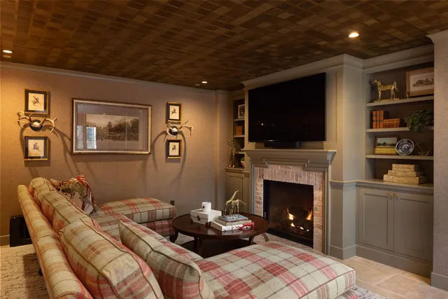 a bathroom with a bathtub and next to a window