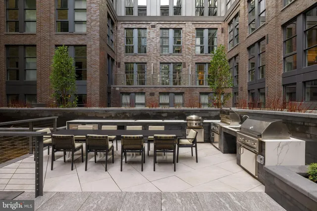 a living room with gym equipment and a window