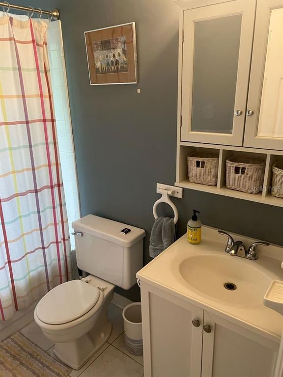 3402 Northwest 2 Street Gainesville, FL 32609 - Photo 15 of 16 a bathroom with a sink and a toilet