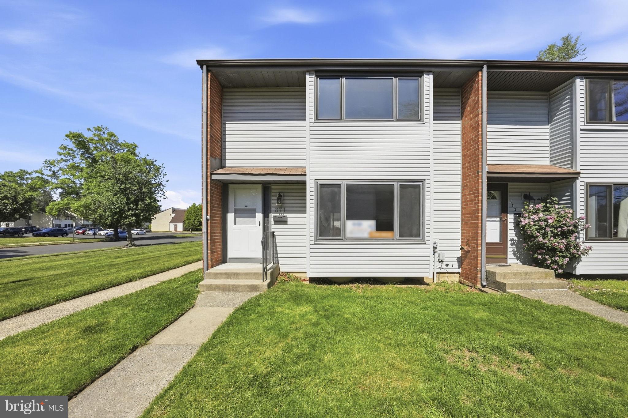371 Bolton Road East Windsor, NJ 08520 - Photo 20 of 20 a front view of a house with a yard