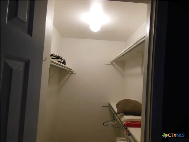 a view of a backyard with a fountain