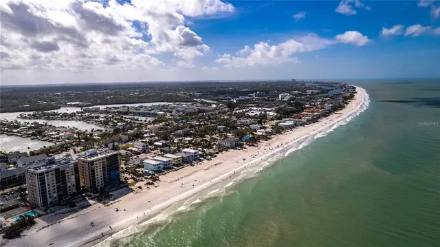 a view of swimming pool with a yard