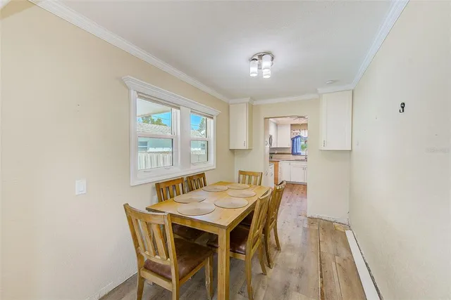 a kitchen with a sink stove and microwave