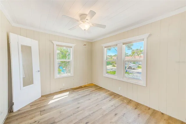 a bathroom with a sink vanity granite toilet and a mirror