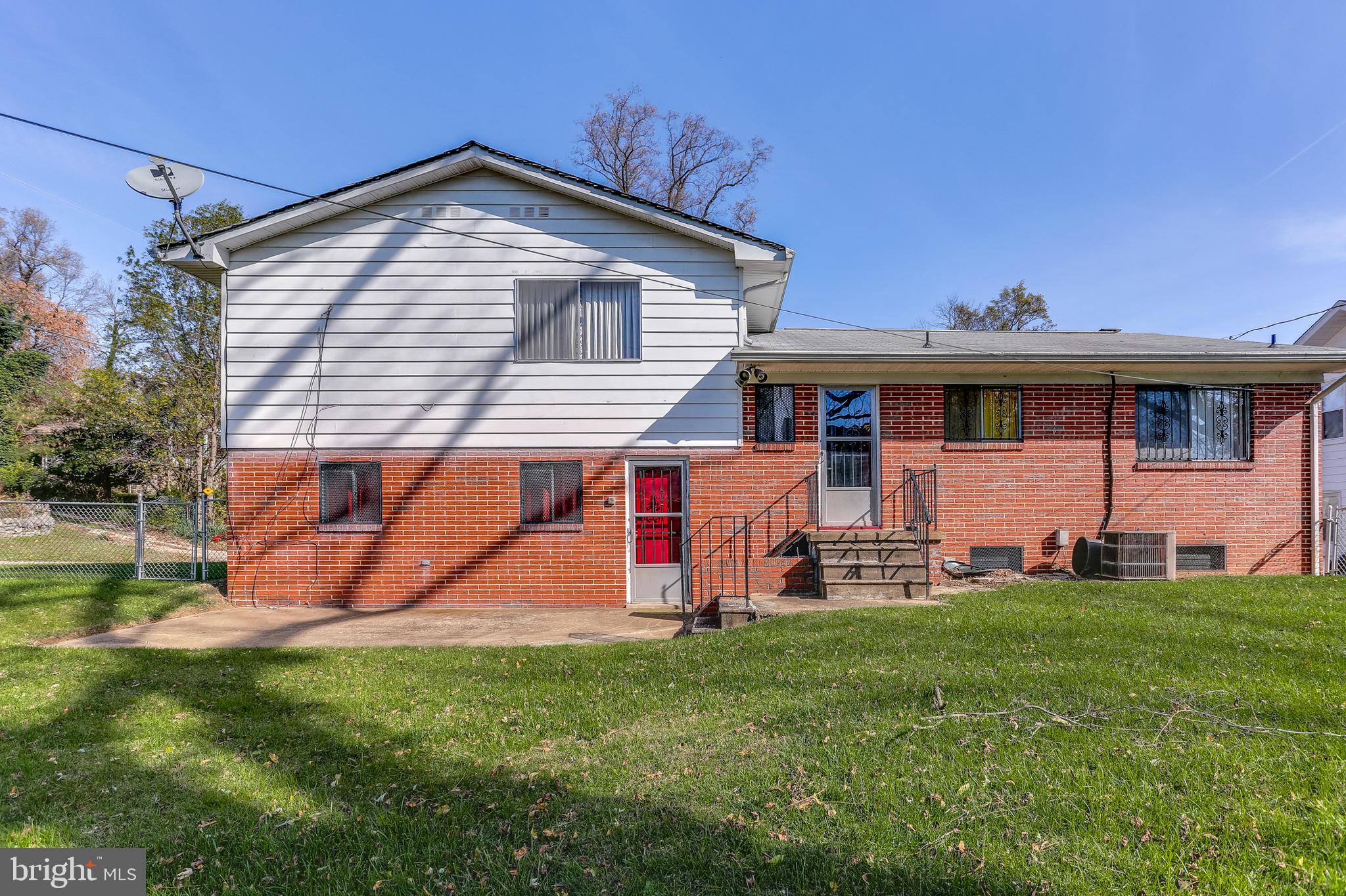 2408 Monticello Road Baltimore, MD 21216 - Photo 3 of 27 a view of a house with a backyard