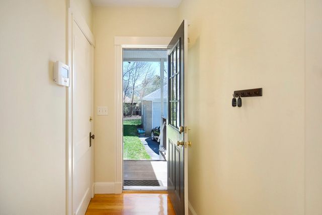 a bathroom with a glass shower door