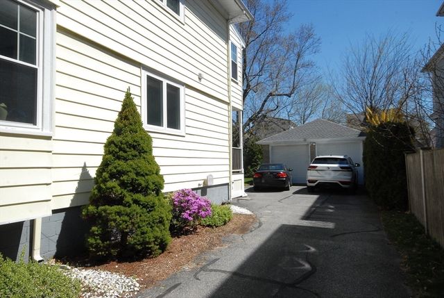 a house view with a backyard space