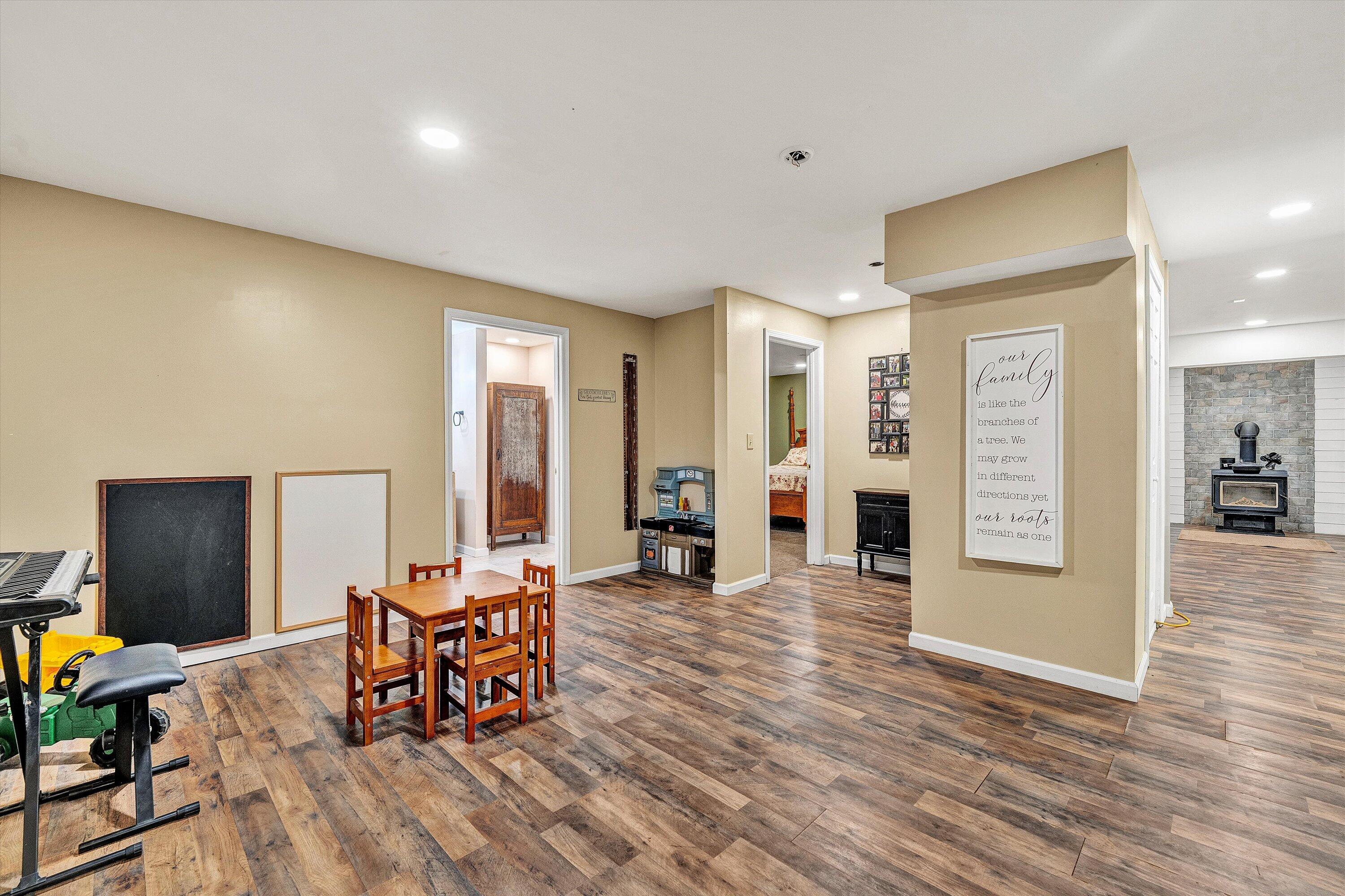 180 Thompson Ridge Circle Ferrum, VA 24088 - Photo 46 of 74 a living room with furniture and wooden floor