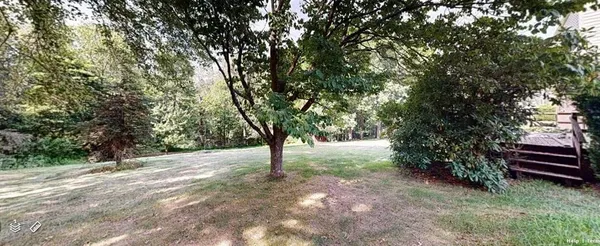 a view of outdoor space and yard