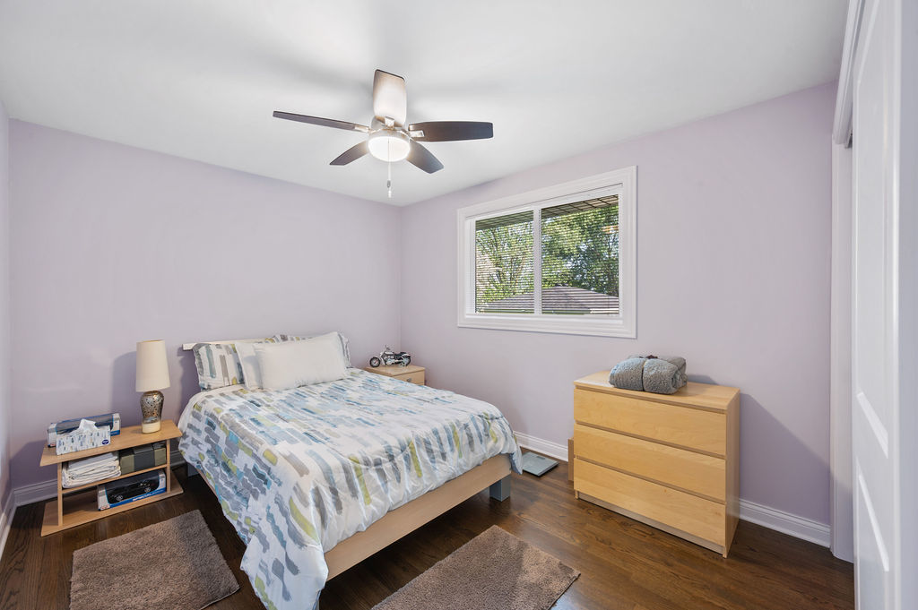 537 West Stearns Road Bartlett, IL 60103 - Photo 18 of 30 a bedroom with a bed and a window