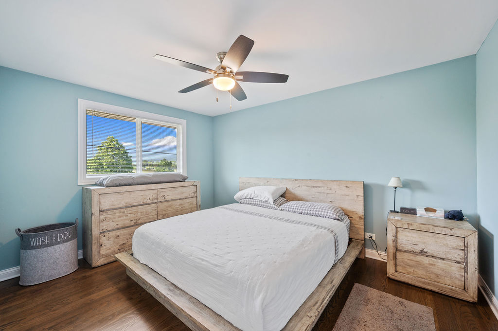537 West Stearns Road Bartlett, IL 60103 - Photo 20 of 30 a bedroom with a bed and a window