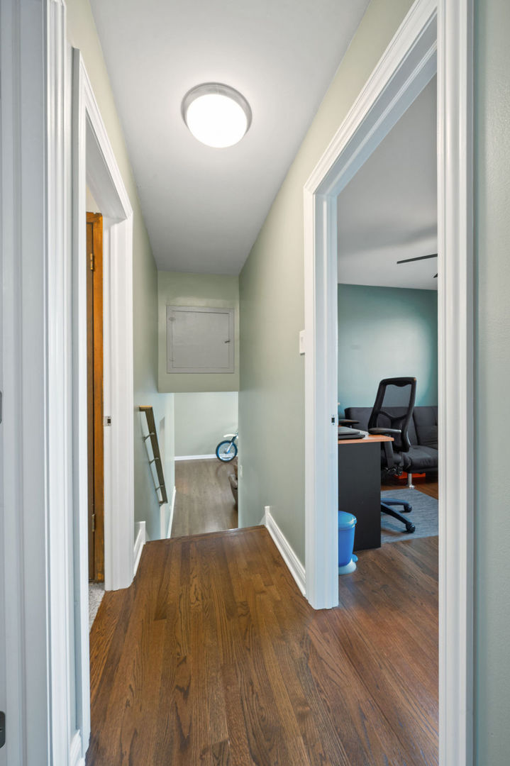 537 West Stearns Road Bartlett, IL 60103 - Photo 24 of 30 a view of a kitchen from a hallway