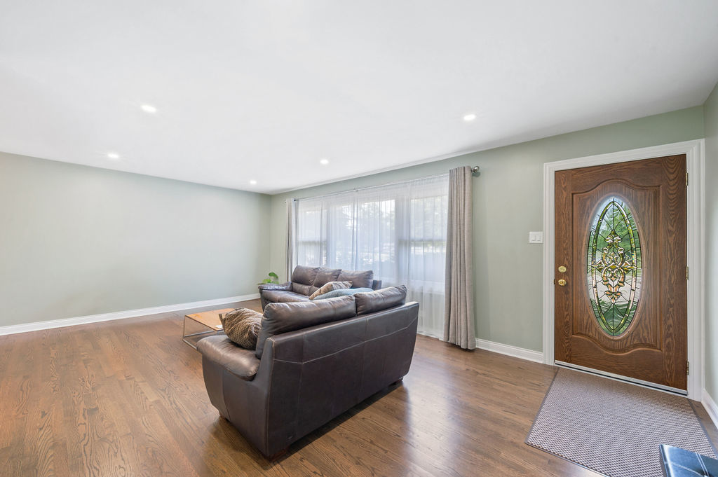 537 West Stearns Road Bartlett, IL 60103 - Photo 6 of 30 a living room with furniture and a window