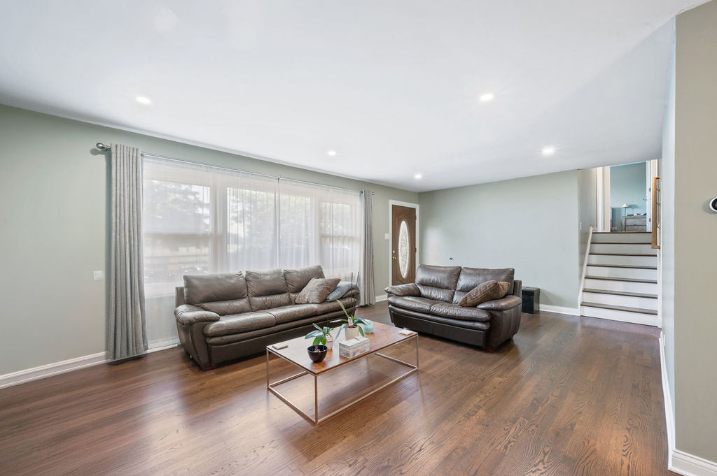 537 West Stearns Road Bartlett, IL 60103 - Photo 7 of 30 a living room with furniture and a large window