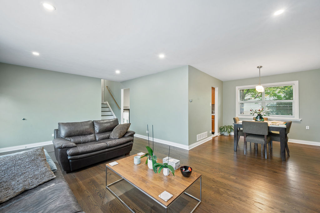 537 West Stearns Road Bartlett, IL 60103 - Photo 9 of 30 a living room with furniture and wooden floor