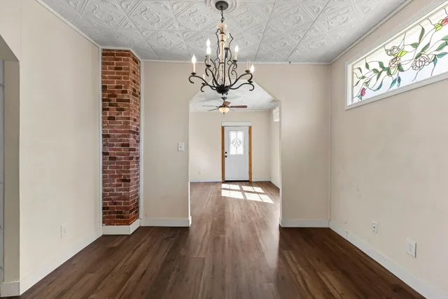 a view of entryway with wooden floor