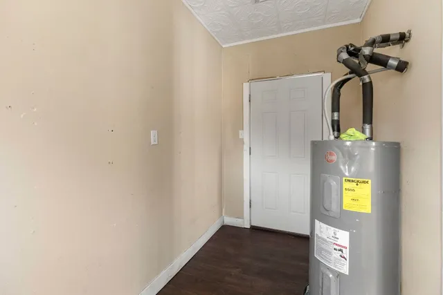 a view of a entryway door with wooden floor