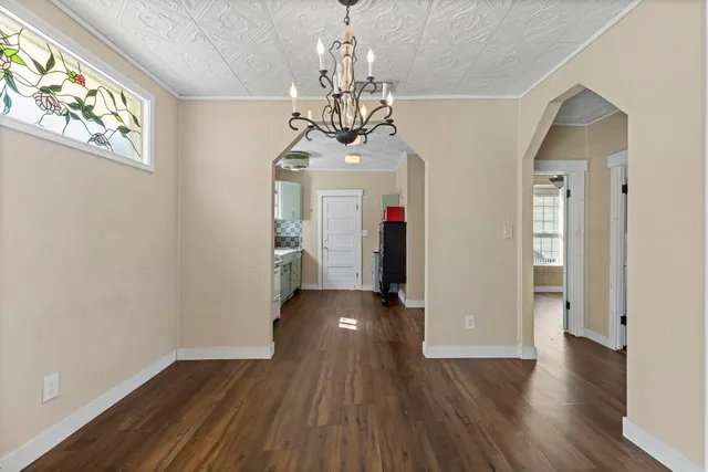 a view of entryway with wooden floor