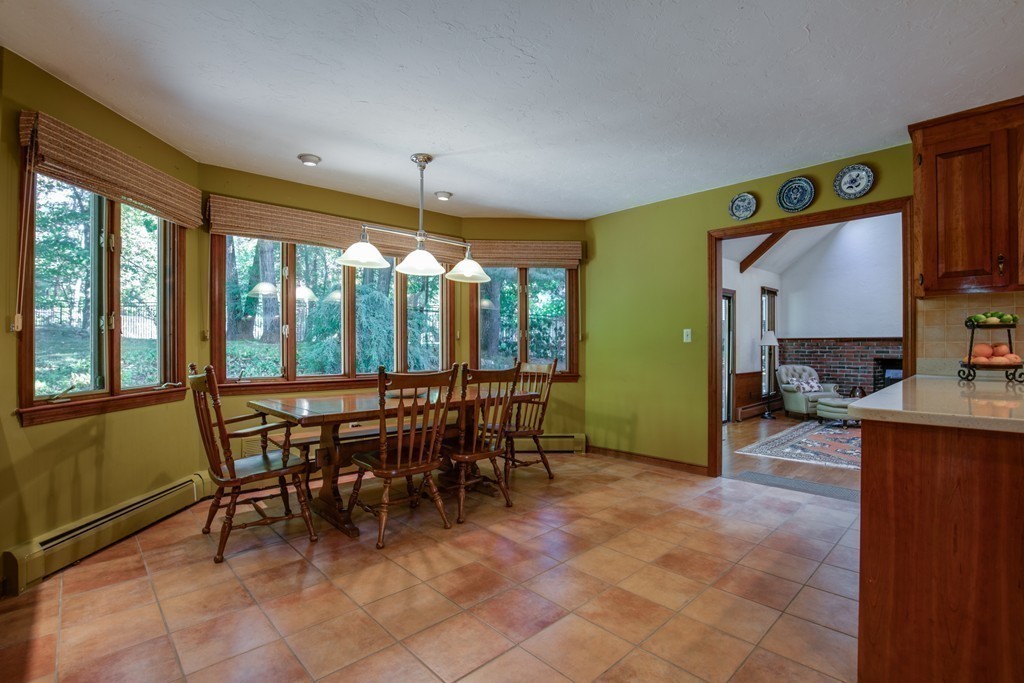 63 Monadnock Road Wellesley, MA 02481 - Photo 12 of 30 a view of a dining room with furniture window and outside view