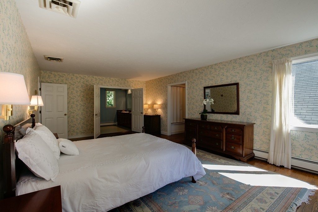 63 Monadnock Road Wellesley, MA 02481 - Photo 20 of 30 a bedroom with a bed and a dresser