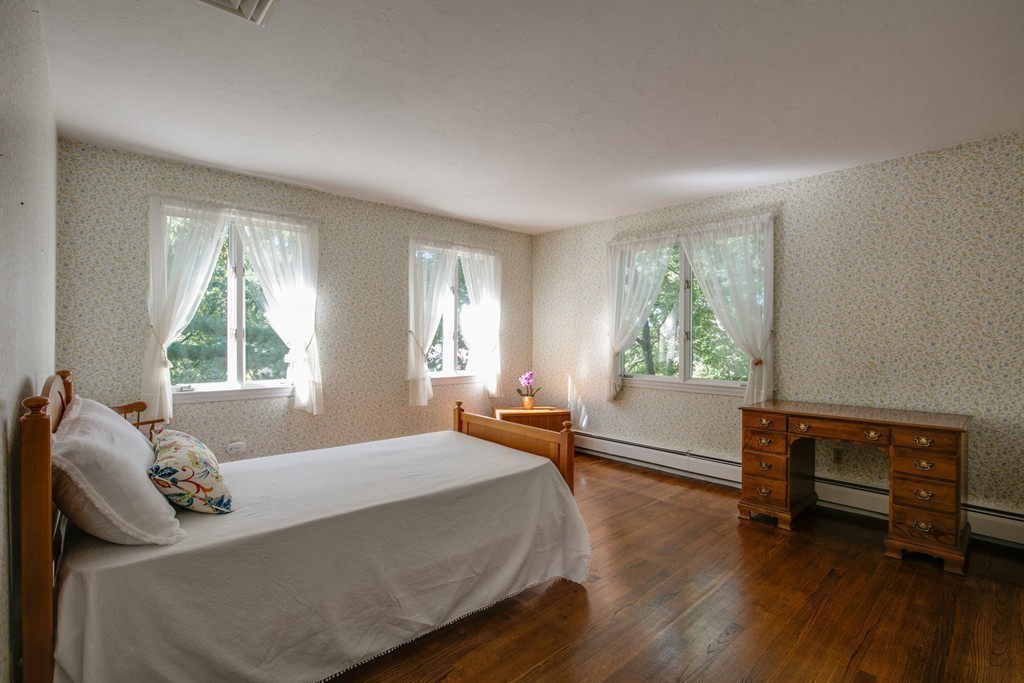 63 Monadnock Road Wellesley, MA 02481 - Photo 25 of 30 a bedroom with furniture and a window