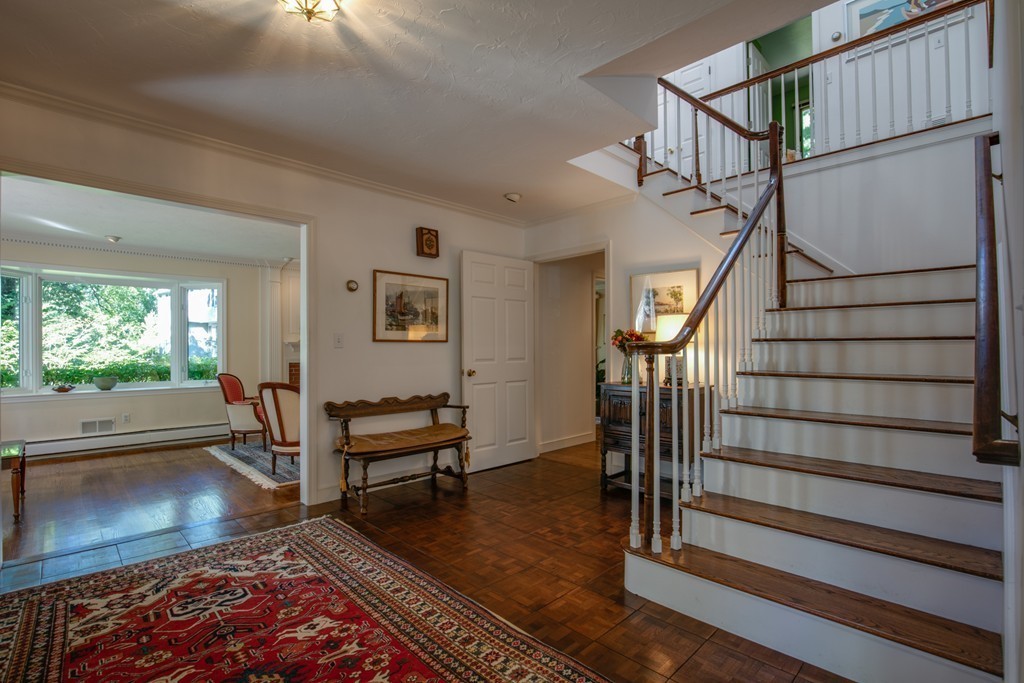 63 Monadnock Road Wellesley, MA 02481 - Photo 3 of 30 a view of entryway livingroom and hall with wooden floor