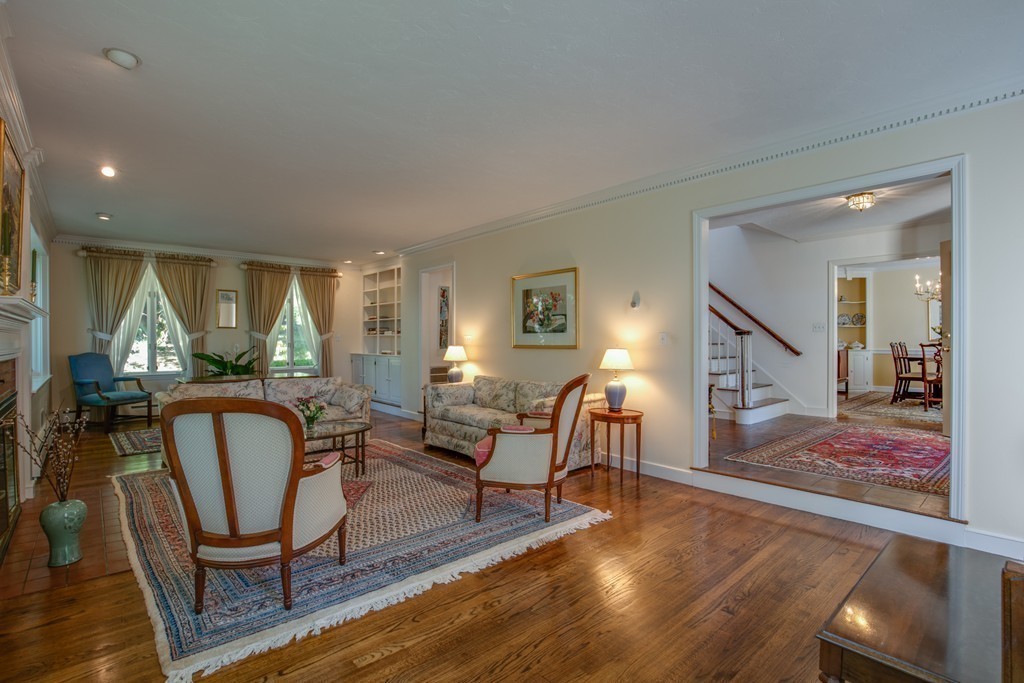 63 Monadnock Road Wellesley, MA 02481 - Photo 4 of 30 a living room with furniture a window and wooden floor