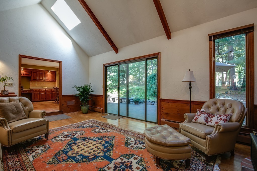 63 Monadnock Road Wellesley, MA 02481 - Photo 8 of 30 a living room with furniture and a large window