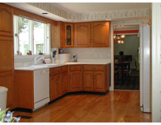 20 Maple Road Wellesley, MA 02481 - Photo 6 of 9 a kitchen with a sink and cabinets