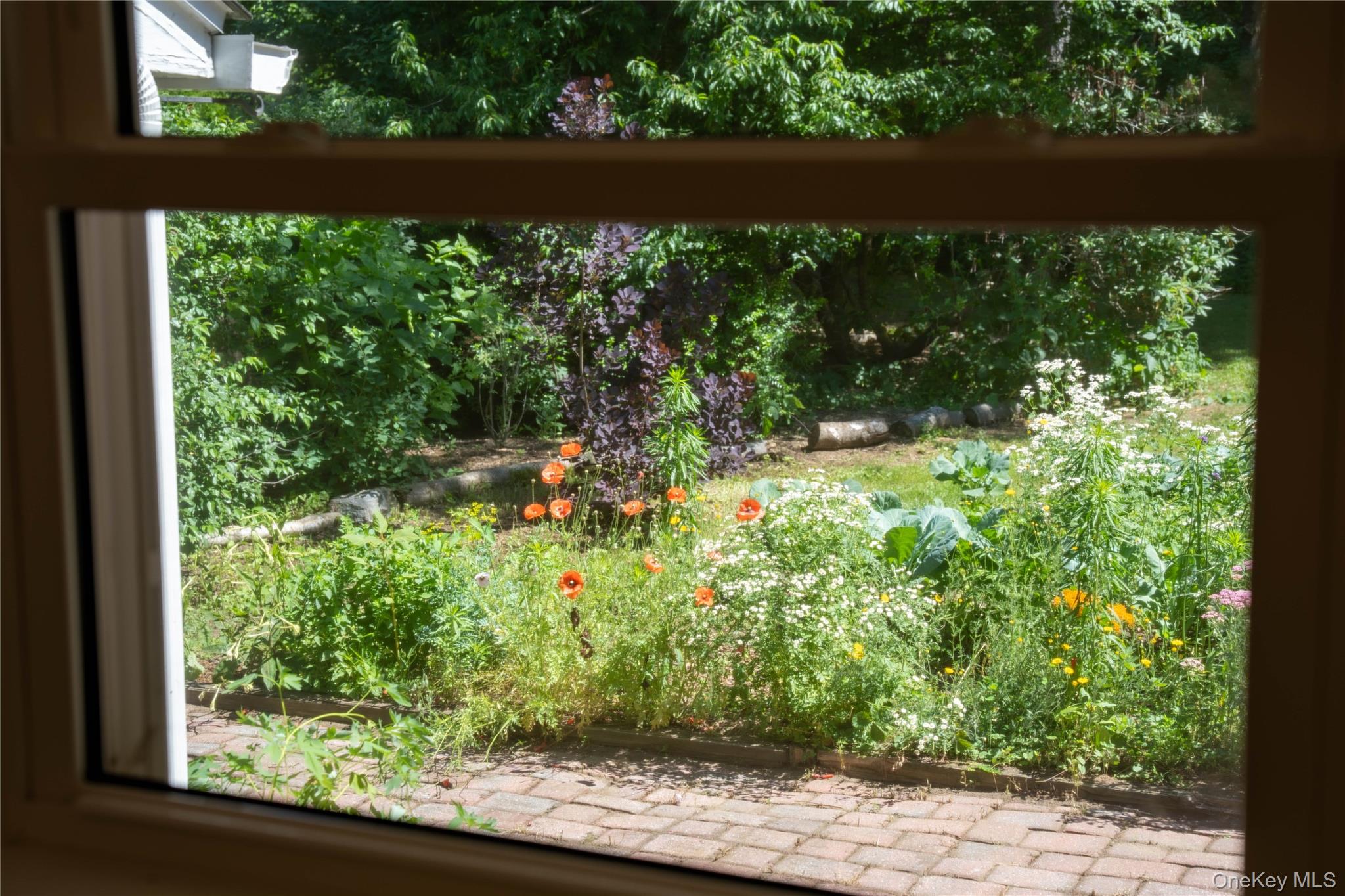46 Schoonmaker Lane Stone Ridge, NY 12484 - Photo 16 of 28 View from the dining room overlooking the garden bed