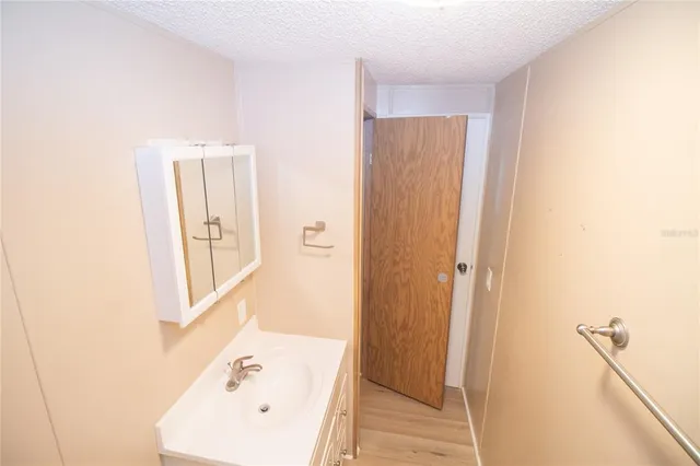 a bathroom with a bathtub and a sink