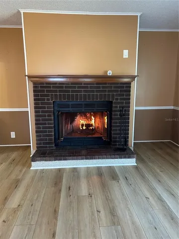 a living room with a fireplace