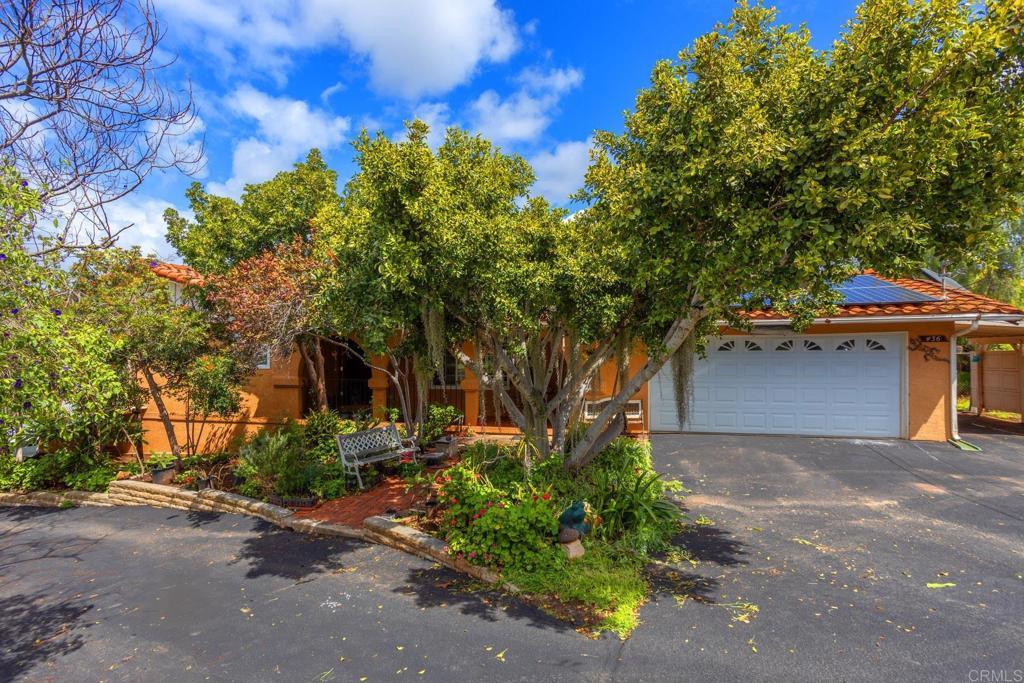 436 Mason Road Vista, CA 92084 - Photo 1 of 32 a front view of a house with a tree