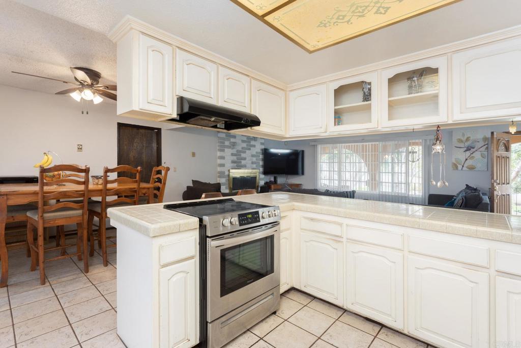 436 Mason Road Vista, CA 92084 - Photo 12 of 32 a kitchen with cabinets and appliances