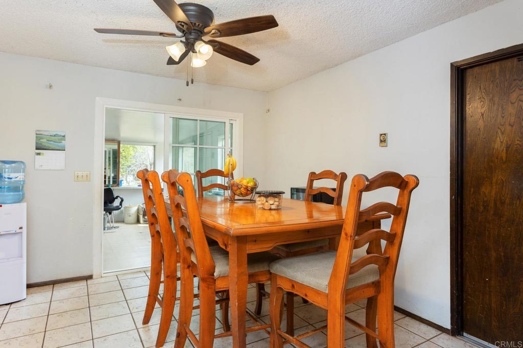 436 Mason Road Vista, CA 92084 - Photo 13 of 32 a dining room with furniture and window