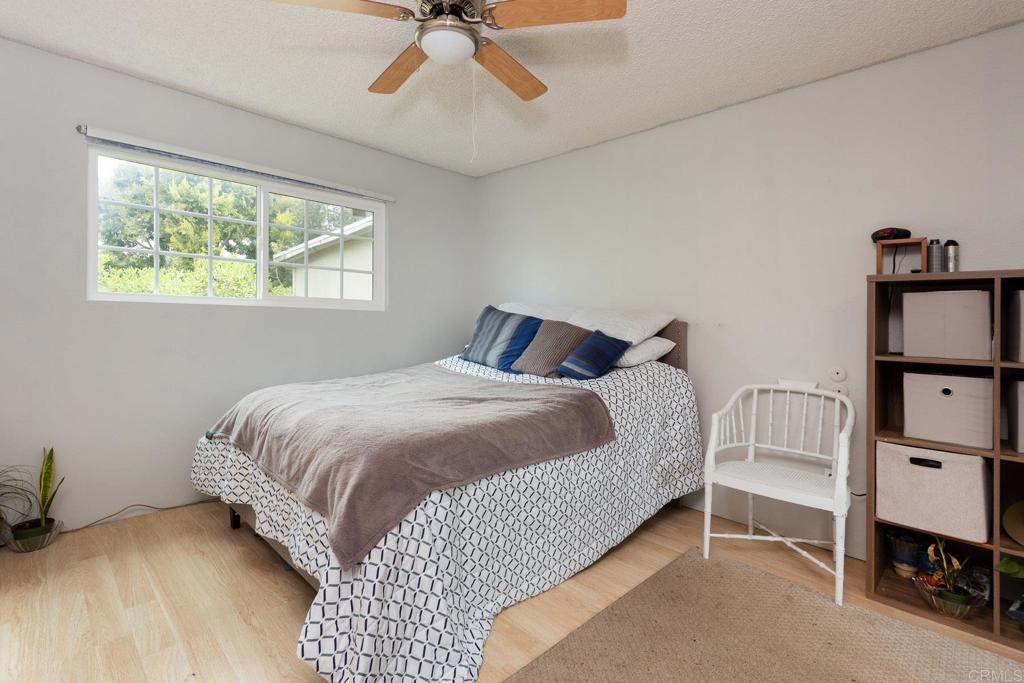436 Mason Road Vista, CA 92084 - Photo 19 of 32 a bedroom with a bed and dresser