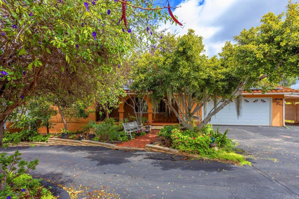 436 Mason Road Vista, CA 92084 - Photo 2 of 32 a front view of a house with a yard and a tree
