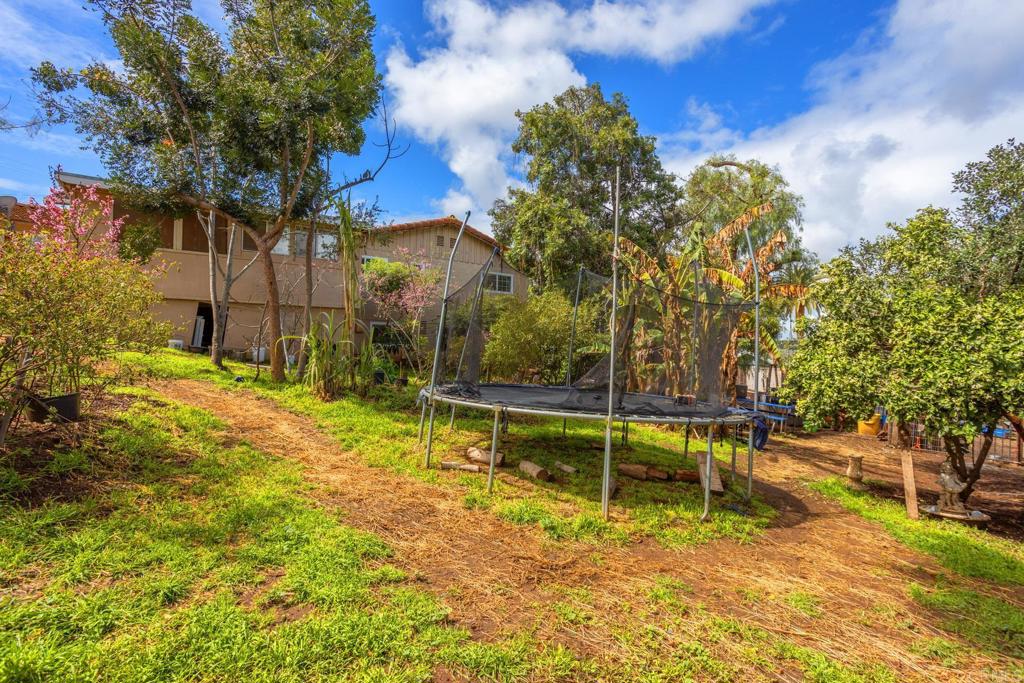 436 Mason Road Vista, CA 92084 - Photo 27 of 32 a view of backyard with wooden fence
