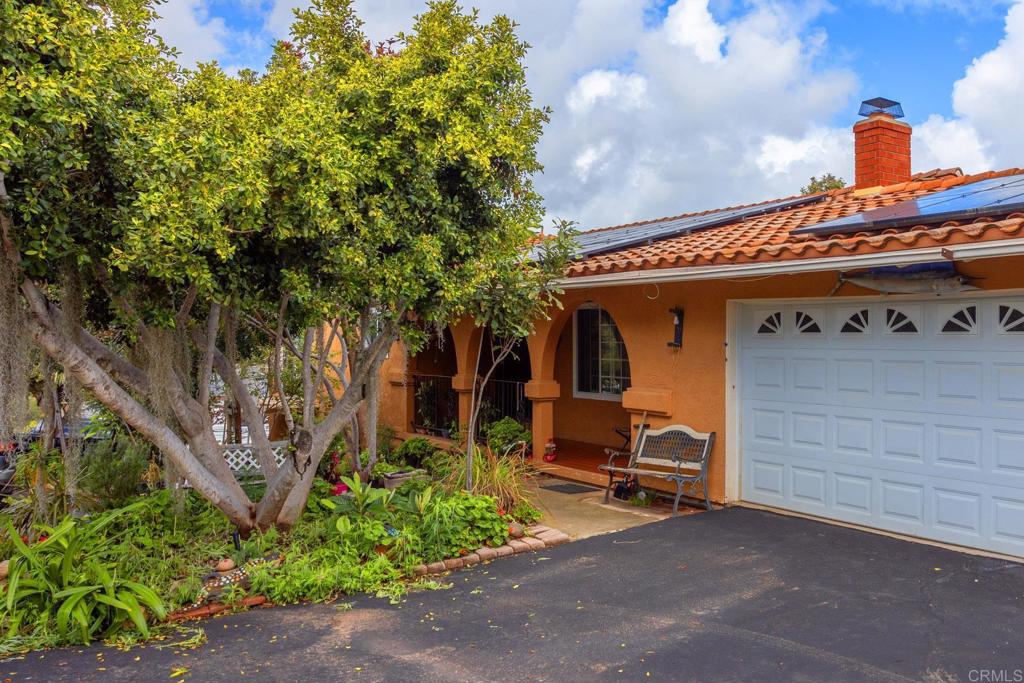 436 Mason Road Vista, CA 92084 - Photo 5 of 32 a front view of a building with garden