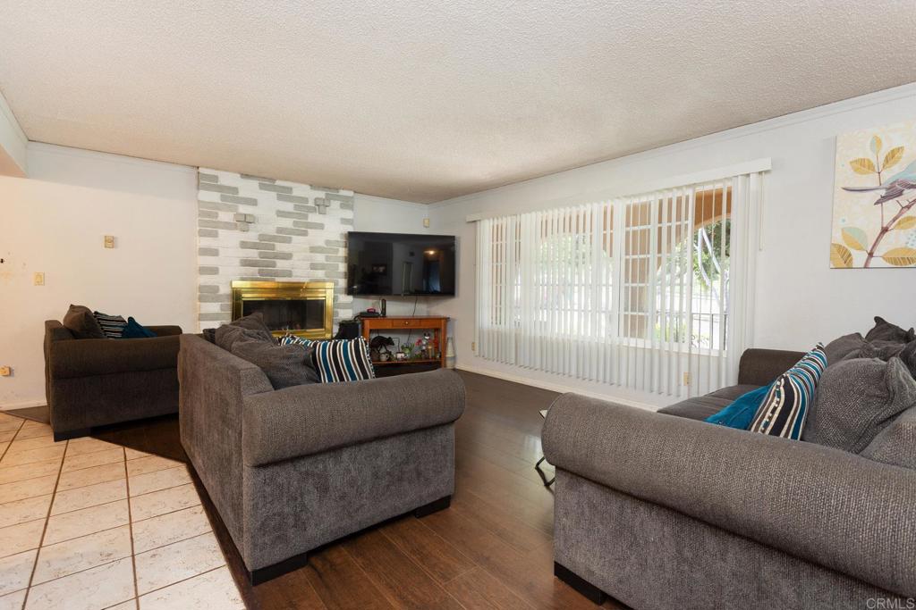 436 Mason Road Vista, CA 92084 - Photo 7 of 32 a living room with furniture and a flat screen tv