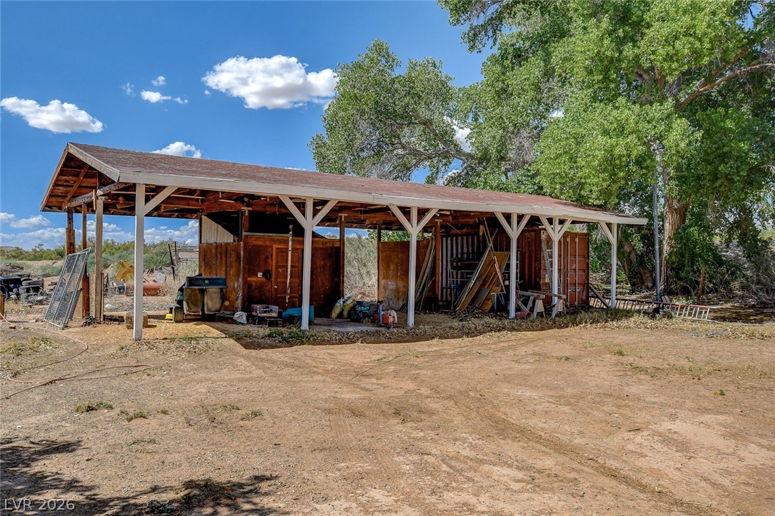 1950 Bowman Road Logandale, NV 89021 - Photo 21 of 98 A spacious, rustic outbuilding offers ample covered storage in a natural setting.